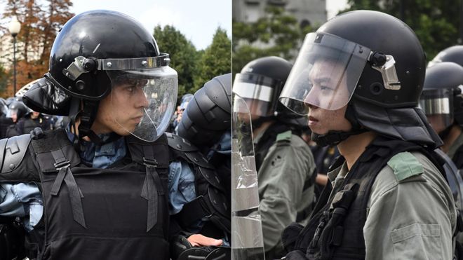 русский и гонконгский полицейские
