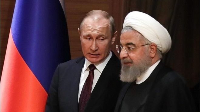 Путин (слева) и Рухани