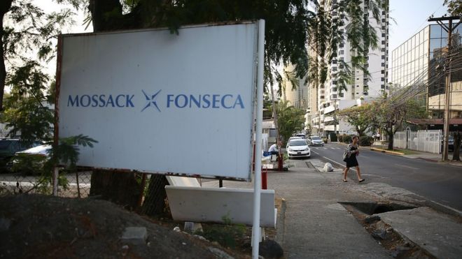 A sign for the law firm Mossack Fonseca and Co is seen across the street from the building on 7 April 2016 in Panama City, Panama