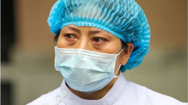 FEBRUARY 13 2020: Tears run out of the eyes of a nurse when she talks about the situation in Jinyintan Hospital