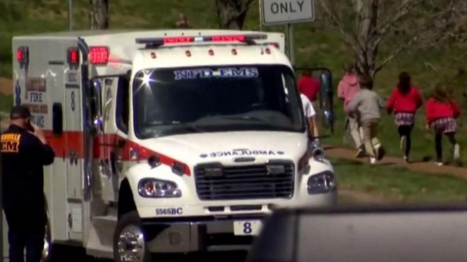 Children and an ambulance at Nashville's Covenant School