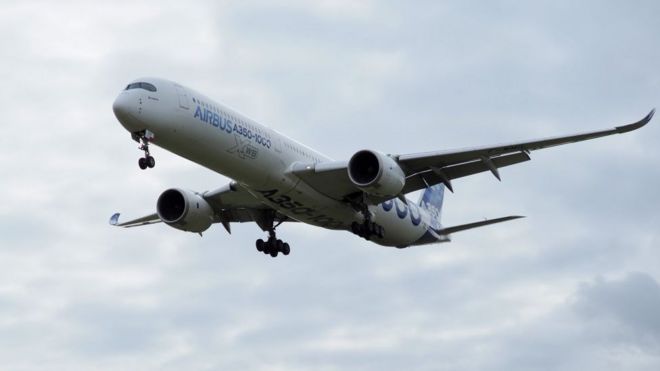 An Airbus A350-1000 conducts a test flight over Chateauroux airport, central France.