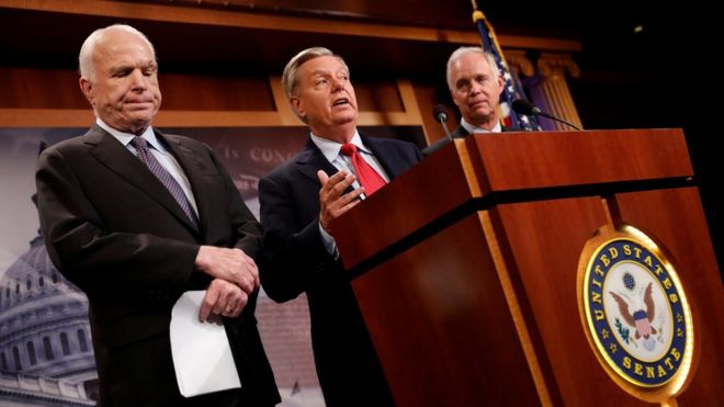 Senator Lindsey Graham, accompanied by Senator John McCain and Senator Ron Johnson, speaks during a press conference about their resistance to the so-called "Skinny Repeal" of the Affordable Care Act on Capitol Hill in Washington