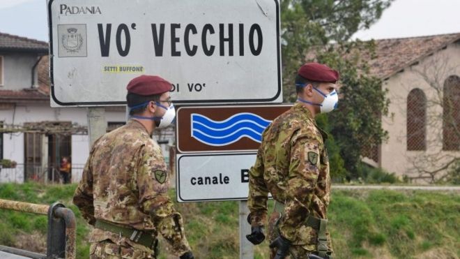 Italian soldiers at checkpoint in town of Vo Vecchio, northern Italy