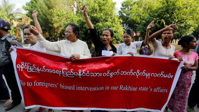 Locals protest against former U.N. Secretary-General Kofi Annan, who is visiting in his capacity as the Myanmar government-appointed Chairman of the Advisory Commission on Rakhine State, near Sittwe airport, Rakhine state, Myanmar December 2, 2016.