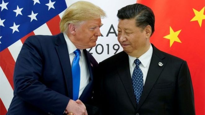 US President Donald Trump shaking hands with Chinese President Xi Jinping