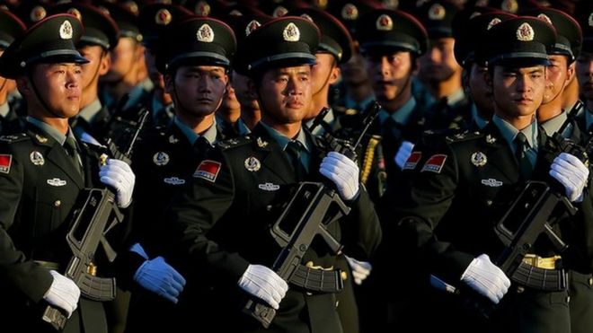 Chinese People"s Liberation Army troops practice marching as they arrive at Tiananmen Gate for a military parade to commemorate the 70th anniversary of the end of the World War II in Beijing Thursday Sept. 3, 2015