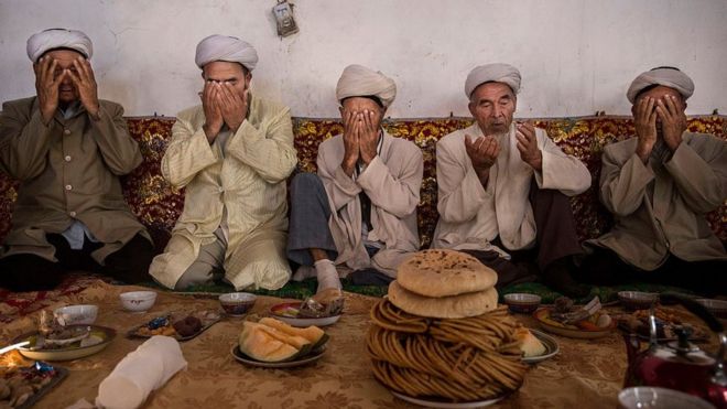 Uigures en Xinjiang.
