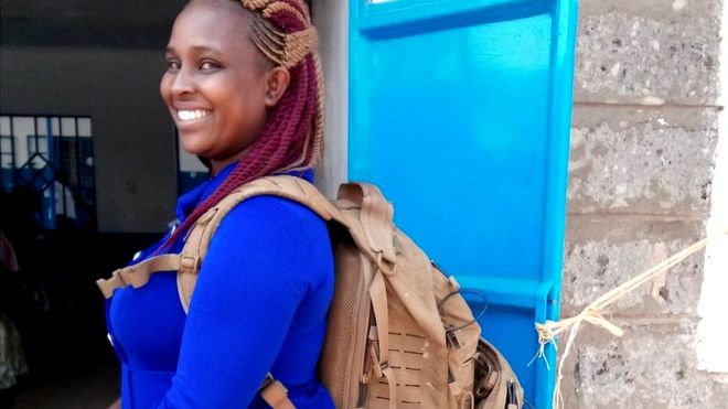 Midwife Margaret Wairimu Maina carries a technology-packed backpack