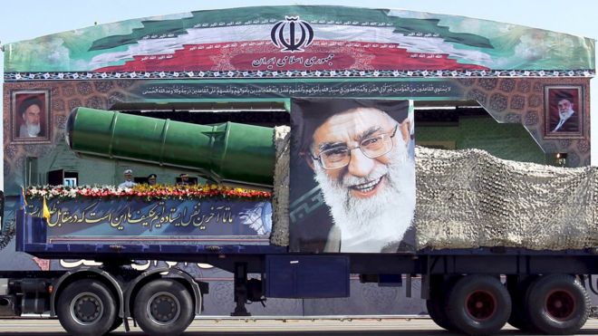 A military truck carrying a missile and a picture of Iran's Supreme Leader Ayatollah Ali Khamenei is seen during a parade marking the anniversary of the Iran-Iraq war (1980-88) in Tehran on 22 September 2015