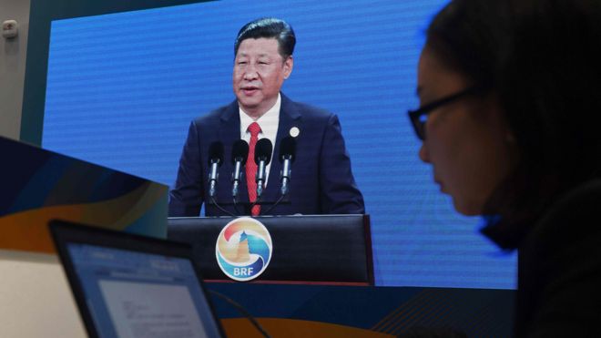 北京“一带一路”国际峰会新闻中心内一面电视屏幕直播习近平在开幕式上演讲（14/5/2017）