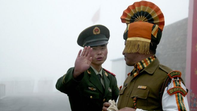 File photo of an Indian and Chinese soldier on the border