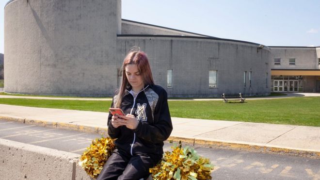 Brandi Levy outside the high school