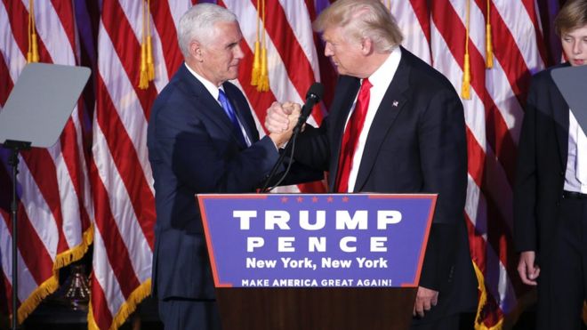 Donald Trump dan wakilnya, Mike Pence, punya tugas untuk menyatukan Amerika yang terpecah belah.