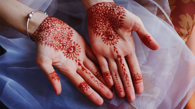 Henna patterns on the hands of a bride