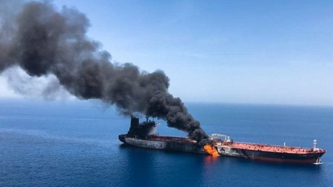 Iran's Isna news agency published an unverified image of what it said was a burning tanker in the Gulf of Oman