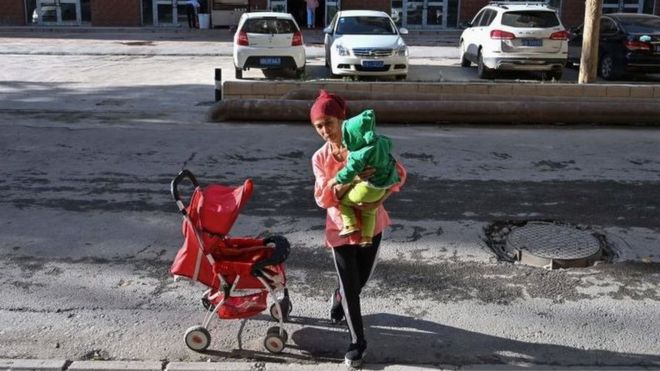 A woman and a child in Aksu, Xinjiang