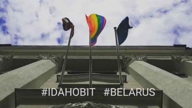 Picture of rainbow flag in front of UK embassy in Minsk