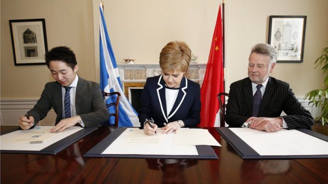 Nicola Sturgeon signing deal