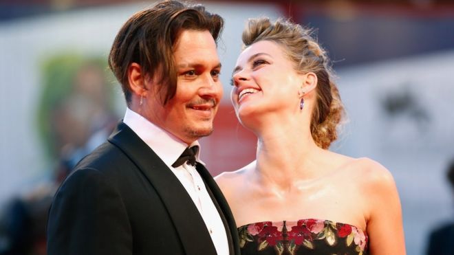 Johnny Depp and actress Amber Heard attend a premiere for 'The Danish Girl' during the 72nd Venice Film Festival at on September 5, 2015 in Venice, Italy.