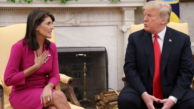 Outgoing US Ambassador to the United Nations Nikki Haley talks with President Donald Trump in the Oval Office