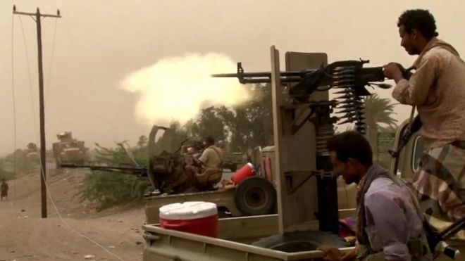 Yemen's pro-government forces fire a heavy machine gun south of Hudaydah airport, Yemen. Photo: 15 June 2018