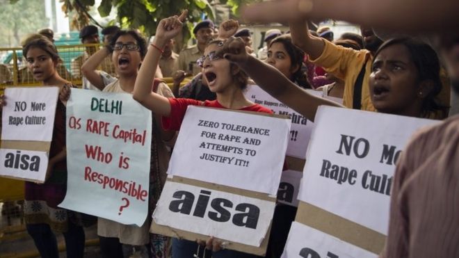 Indian students shout slogans during a protest against the latest incidents of rape in New Delhi, India, Sunday, Oct. 18, 2015