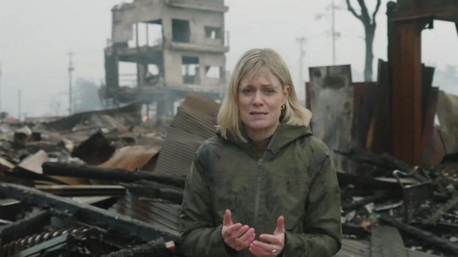 The BBC's Jean Mackenzie stands in front of a destroyed building