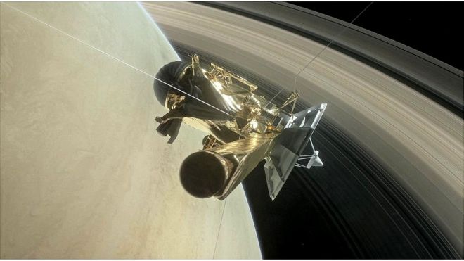 Artwork: Cassini is running the narrow gap between the top of the planet's atmosphere and the rings
