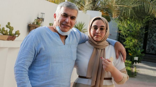 Bahraini prominent human rights activist Nabeel Rajab and his daughter pose for a photo