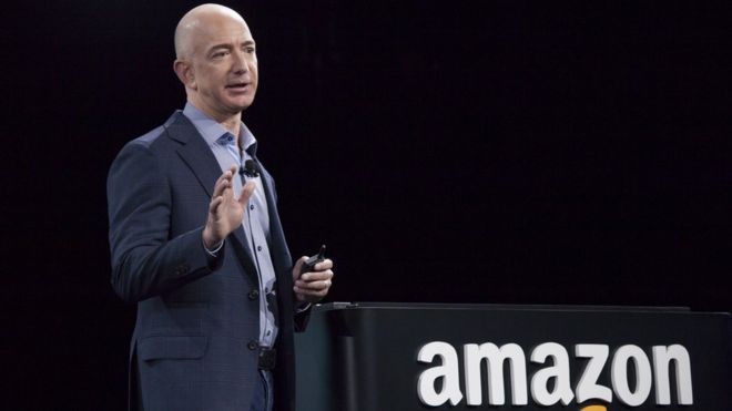 Jeff Bezos and amazon log0