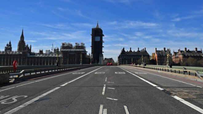 A deserted Westminster Bridge is pictured looking north