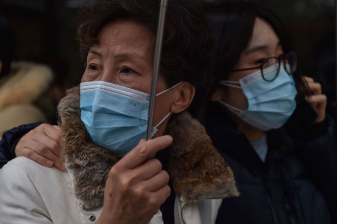 Women wear masks in Shanghai