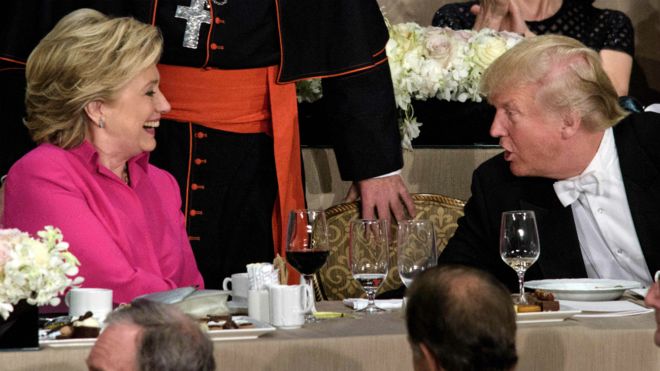 Hillary Clinton and Donald Trump shake hands after speaking during the Al Smith dinner in New York - 20 October 2016