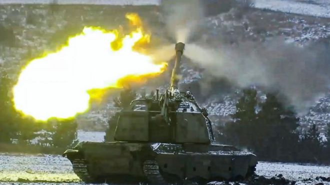 A Russian tank fires in the Donetsk region