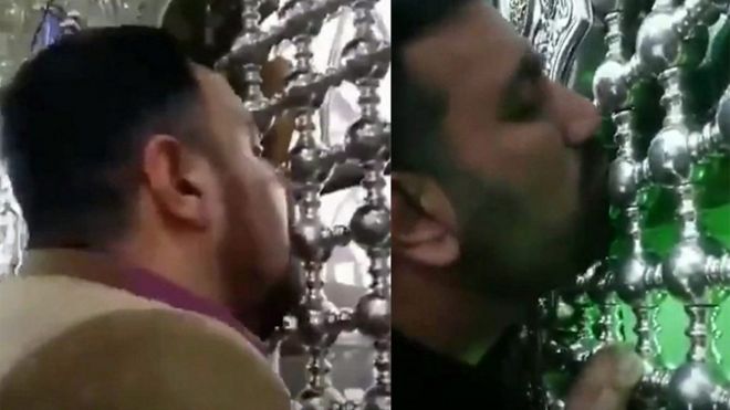 إيرانيان يلعقان ضريحين في مشهد وقم رغم تفشي فيروس كورونا