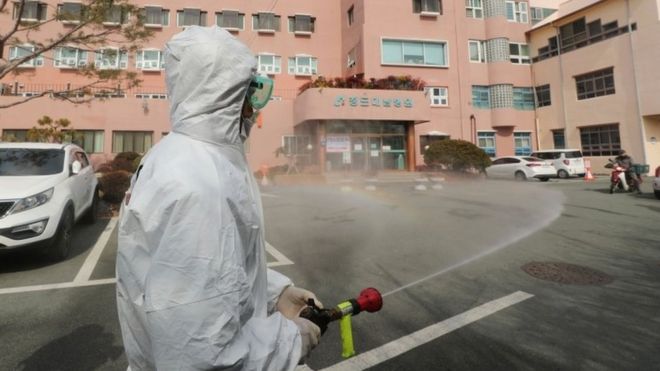 A worker disinfects the streets in Cheongdo, South Korea. Photo: 21 February 2020