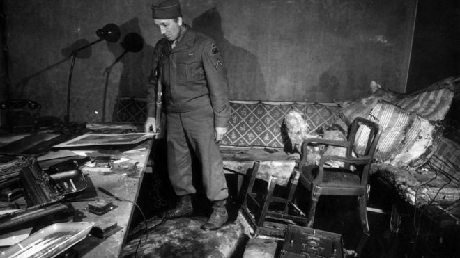 US soldier inside fire-ravaged bunker in 1945