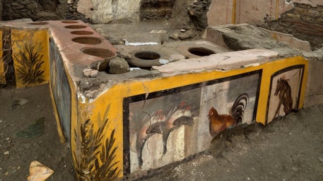 Frescos on an ancient counter discovered during excavations in Pompeii, Italy