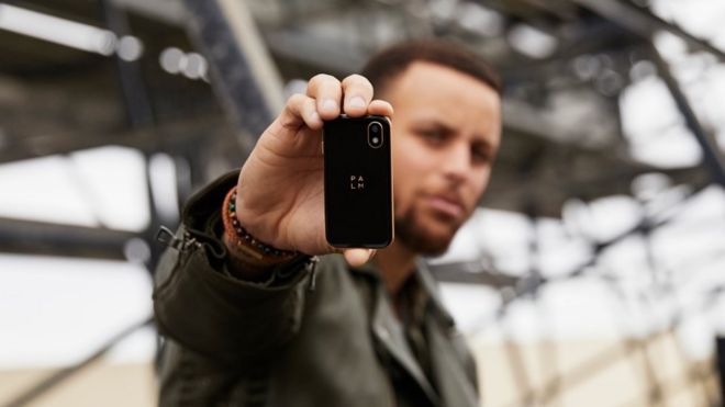 Palm phone held by Stephen Curry