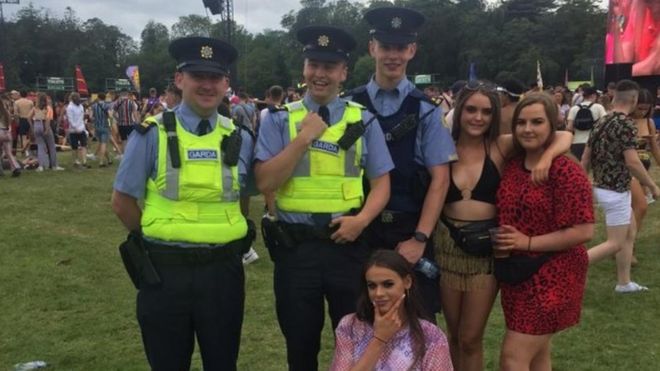 Irish police posed for photos with festival goers on Friday