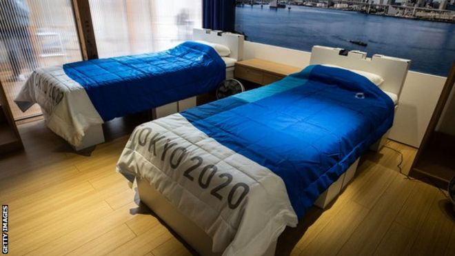 Athlete rooms in the Tokyo 2020 Olympic village showing two beds