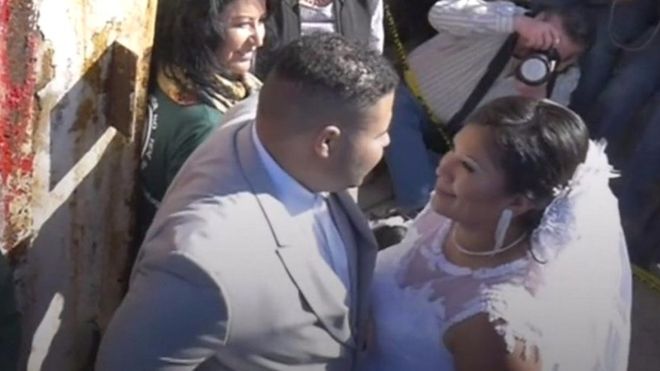 Getting married at the US-Mexico border's 'door of hope'.