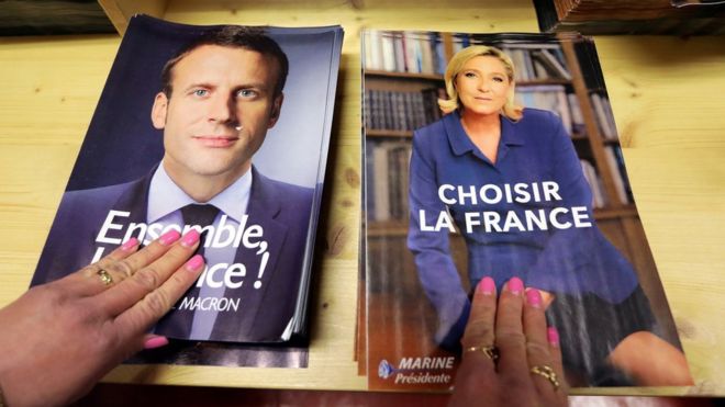 Emmanuel Macron propaganda eleitoral e Marine Le Pen.