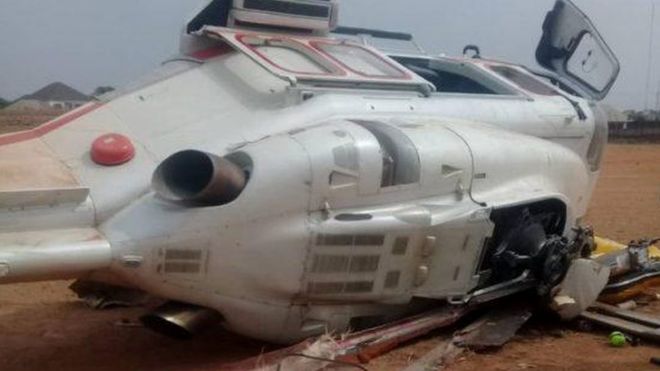 A photo of the helicopter that crashed near Kabba Township Stadium in Nigeria tweeted by a member of Yemi Osinbajo's media team