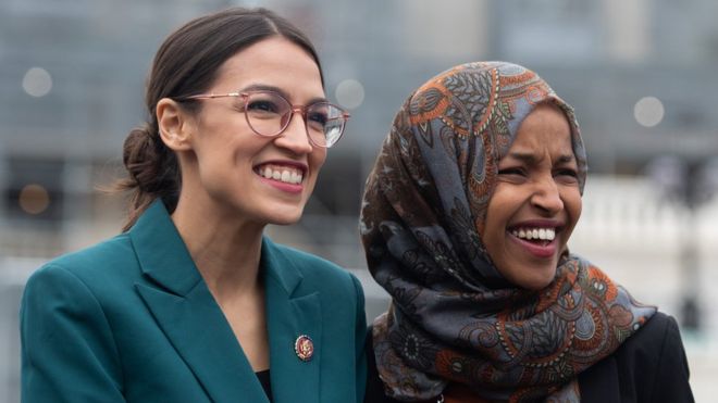 US Representative Alexandria Ocasio-Cortez, Democrat of New York, and US Representative Ilhan Omar (R), Democrat of Minnesota,