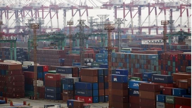 Containers are seen at a port of Shanghai Free Trade Zone, in this February 11, 2014 file photo.
