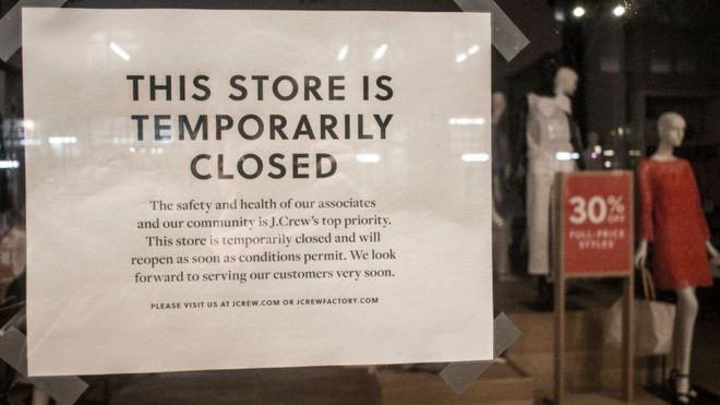 Sign in J Crew shop window