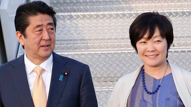 In this Feb. 10, 2017, file photo, Japanese Prime Minister Shinzo Abe and his wife Akie Abe step off of Air Force One as they arrive in West Palm Beach, Florida, USA.