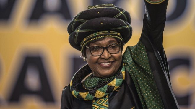 Winnie Mandela waves as she attends the 54th ANC National Conference at the NASREC Expo Centre in Johannesburg.